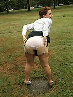Angie shows off her panties and nylons outside