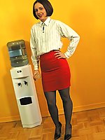 Hot secretary MILF in nylons and heels performing office striptease