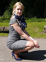 Sexy Milf Iona can't help but show off and tease you in her gorgeous tall blue stilettos