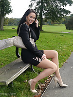 A tight black dress and creamy high stiletto heels gets this dark haired beauty in the mood for some outdoor fun