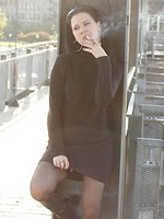Sexy smoker in stockings flashes pussy in public