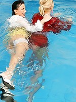 Three wet lesbians playing with each other in the deep end